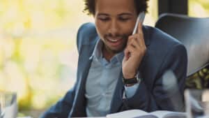 Real estate ISA (Inside Sales Agent) working the phones — cold calling and lead follow-up